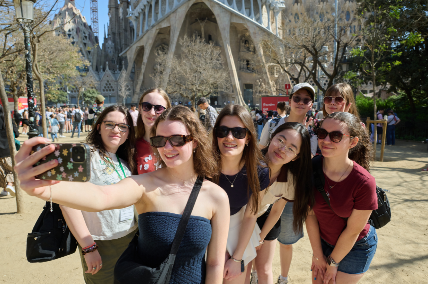 Students on a school trip in Barcelona, outside the Sagrada Família.